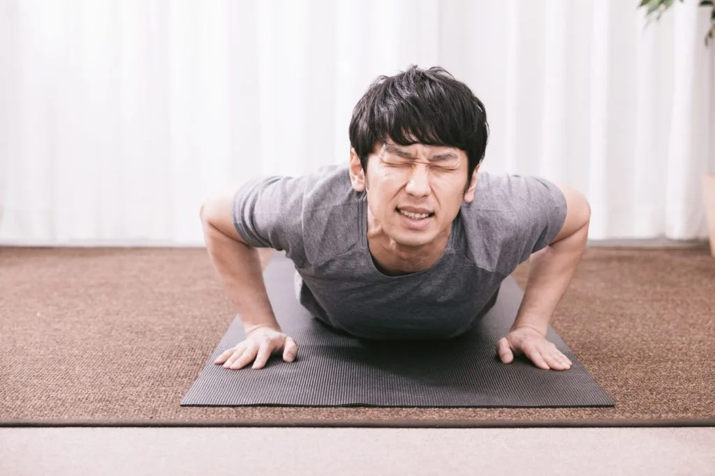 苦悶の表情